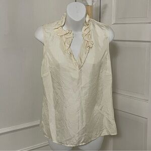 Elizabeth Mckay Sleeveless Silk Blouse in Cream with a‎ ruffle neck detail